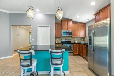 Welcome to this delightful corner-lot home nestled in the heart on Venetian Bay Golf Course in Florida - for sale on GolfHomes.com, golf home, golf lot
