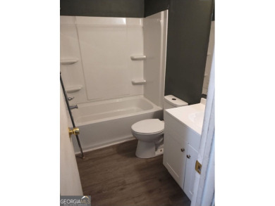 Discover this beautifully updated home nestled in a desirable on Golf Club of Macon in Georgia - for sale on GolfHomes.com, golf home, golf lot
