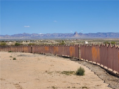 Welcome to this exceptional opportunity to own a flat, buildable on El Rio Golf and Country Club in Arizona - for sale on GolfHomes.com, golf home, golf lot