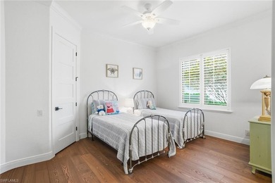 Prepare to experience a residence where timeless craftsmanship on Shadow Wood Preserve in Florida - for sale on GolfHomes.com, golf home, golf lot