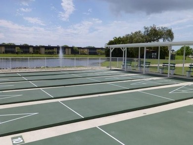 55+ community. Welcome to this appealing second-floor residence on Kings Point Golf -Flanders Way in Florida - for sale on GolfHomes.com, golf home, golf lot