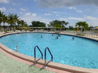 55+ community. Welcome to this appealing second-floor residence on Kings Point Golf -Flanders Way in Florida - for sale on GolfHomes.com, golf home, golf lot