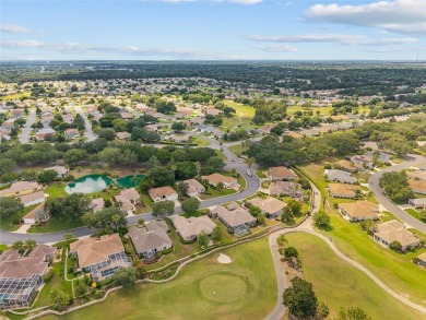 BE SURE TO SEE THE VIDEO TOUR!  OVERLOOKING THE TEE BOX of #1 on Eagle Ridge At Spruce Creek Country Club in Florida - for sale on GolfHomes.com, golf home, golf lot