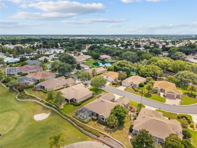 BE SURE TO SEE THE VIDEO TOUR!  OVERLOOKING THE TEE BOX of #1 on Eagle Ridge At Spruce Creek Country Club in Florida - for sale on GolfHomes.com, golf home, golf lot