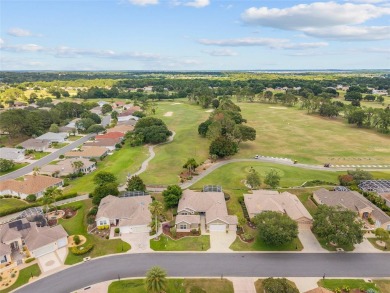 BE SURE TO SEE THE VIDEO TOUR!  OVERLOOKING THE TEE BOX of #1 on Eagle Ridge At Spruce Creek Country Club in Florida - for sale on GolfHomes.com, golf home, golf lot