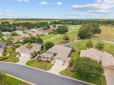 BE SURE TO SEE THE VIDEO TOUR!  OVERLOOKING THE TEE BOX of #1 on Eagle Ridge At Spruce Creek Country Club in Florida - for sale on GolfHomes.com, golf home, golf lot
