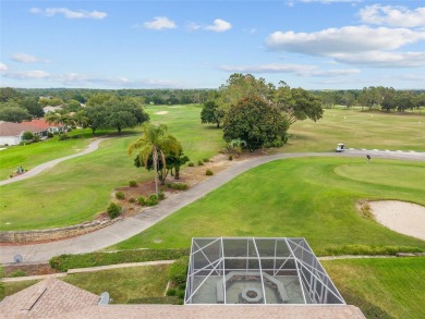 BE SURE TO SEE THE VIDEO TOUR!  OVERLOOKING THE TEE BOX of #1 on Eagle Ridge At Spruce Creek Country Club in Florida - for sale on GolfHomes.com, golf home, golf lot