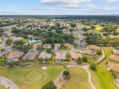 BE SURE TO SEE THE VIDEO TOUR!  OVERLOOKING THE TEE BOX of #1 on Eagle Ridge At Spruce Creek Country Club in Florida - for sale on GolfHomes.com, golf home, golf lot