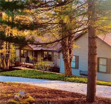 Tucked away in the trees on two beautifully wooded lots at Lake on Lake Mohawk Golf Club in Ohio - for sale on GolfHomes.com, golf home, golf lot
