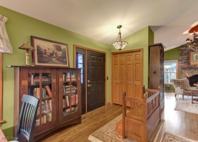 Tucked away in the trees on two beautifully wooded lots at Lake on Lake Mohawk Golf Club in Ohio - for sale on GolfHomes.com, golf home, golf lot