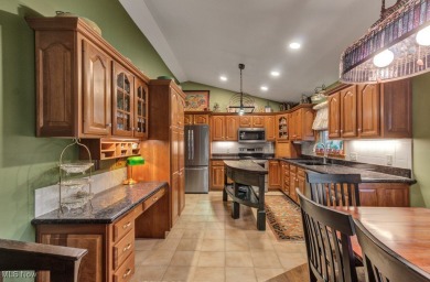 Tucked away in the trees on two beautifully wooded lots at Lake on Lake Mohawk Golf Club in Ohio - for sale on GolfHomes.com, golf home, golf lot
