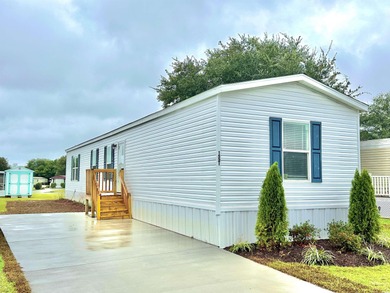 2025 NEW HOME located in the coastal getaway in 55+ Waterway on Barefoot Resort and Golf Club  in South Carolina - for sale on GolfHomes.com, golf home, golf lot
