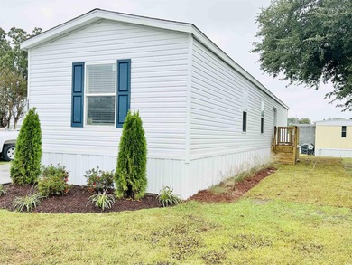 2025 NEW HOME located in the coastal getaway in 55+ Waterway on Barefoot Resort and Golf Club  in South Carolina - for sale on GolfHomes.com, golf home, golf lot