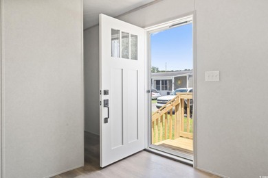 2025 NEW HOME located in the coastal getaway in 55+ Waterway on Barefoot Resort and Golf Club  in South Carolina - for sale on GolfHomes.com, golf home, golf lot