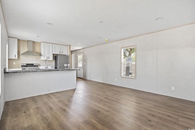 2025 NEW HOME located in the coastal getaway in 55+ Waterway on Barefoot Resort and Golf Club  in South Carolina - for sale on GolfHomes.com, golf home, golf lot