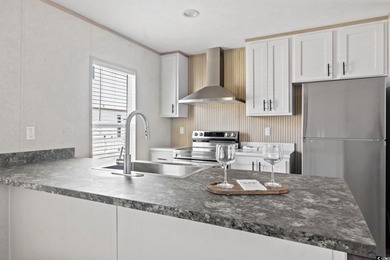 2025 NEW HOME located in the coastal getaway in 55+ Waterway on Barefoot Resort and Golf Club  in South Carolina - for sale on GolfHomes.com, golf home, golf lot