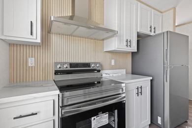 2025 NEW HOME located in the coastal getaway in 55+ Waterway on Barefoot Resort and Golf Club  in South Carolina - for sale on GolfHomes.com, golf home, golf lot