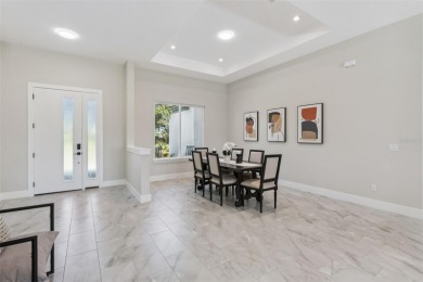 Where Luxury Meets Comfort -- Your Dream Home Awaits on a Full on Wedgefield Golf Club in Florida - for sale on GolfHomes.com, golf home, golf lot
