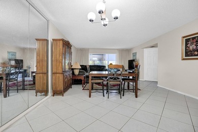 Enjoy the best of 55+ living in this lovely 2-bedroom, 2-bath on Wynmoor Golf Course in Florida - for sale on GolfHomes.com, golf home, golf lot