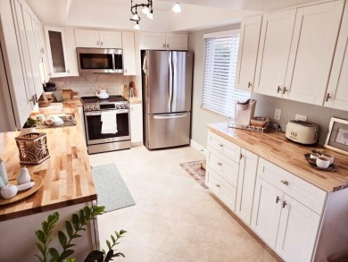 Beautifully updated 2 bedroom, 2 bath, 1st floor, furnished on Ocean Village Golf Course in Florida - for sale on GolfHomes.com, golf home, golf lot
