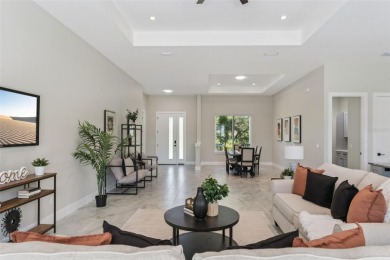 Where Luxury Meets Comfort -- Your Dream Home Awaits on a Full on Wedgefield Golf Club in Florida - for sale on GolfHomes.com, golf home, golf lot