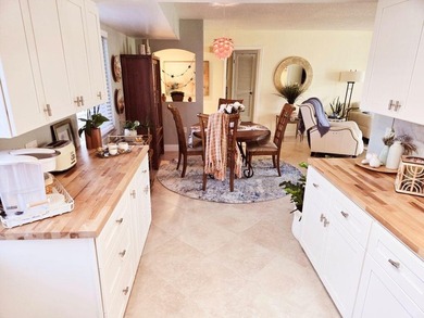 Beautifully updated 2 bedroom, 2 bath, 1st floor, furnished on Ocean Village Golf Course in Florida - for sale on GolfHomes.com, golf home, golf lot