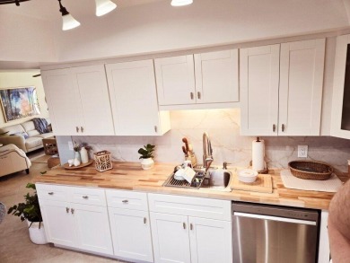 Beautifully updated 2 bedroom, 2 bath, 1st floor, furnished on Ocean Village Golf Course in Florida - for sale on GolfHomes.com, golf home, golf lot