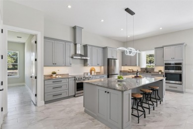 Where Luxury Meets Comfort -- Your Dream Home Awaits on a Full on Wedgefield Golf Club in Florida - for sale on GolfHomes.com, golf home, golf lot