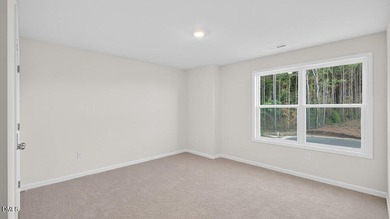 Welcome to 2214 Redpoll Drive at Horton Park, located in Apex on Knights Play Golf Center in North Carolina - for sale on GolfHomes.com, golf home, golf lot