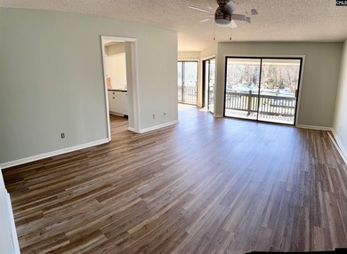 Come home and relax overlooking the water and boats in the cove on Club At Rawls Creek in South Carolina - for sale on GolfHomes.com, golf home, golf lot