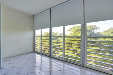 Enjoy the best of 55+ living in this lovely 2-bedroom, 2-bath on Wynmoor Golf Course in Florida - for sale on GolfHomes.com, golf home, golf lot