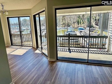 Come home and relax overlooking the water and boats in the cove on Club At Rawls Creek in South Carolina - for sale on GolfHomes.com, golf home, golf lot