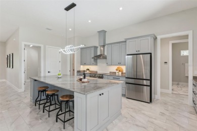 Where Luxury Meets Comfort -- Your Dream Home Awaits on a Full on Wedgefield Golf Club in Florida - for sale on GolfHomes.com, golf home, golf lot