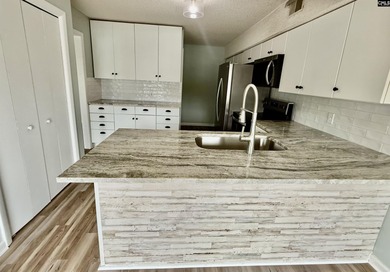 Come home and relax overlooking the water and boats in the cove on Club At Rawls Creek in South Carolina - for sale on GolfHomes.com, golf home, golf lot