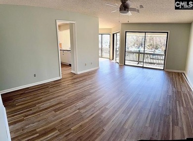 Come home and relax overlooking the water and boats in the cove on Club At Rawls Creek in South Carolina - for sale on GolfHomes.com, golf home, golf lot