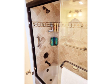 Beautifully updated 2 bedroom, 2 bath, 1st floor, furnished on Ocean Village Golf Course in Florida - for sale on GolfHomes.com, golf home, golf lot
