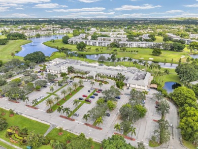 Enjoy the best of 55+ living in this lovely 2-bedroom, 2-bath on Wynmoor Golf Course in Florida - for sale on GolfHomes.com, golf home, golf lot