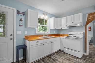 Welcome to 132 NE 3rd St, Oak Island, where laid-back beach on Founders Club At St. James Plantation in North Carolina - for sale on GolfHomes.com, golf home, golf lot