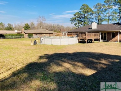 Must see! Gorgeous one story all brick home situated on half an on Cherokee Rose Country Club in Georgia - for sale on GolfHomes.com, golf home, golf lot