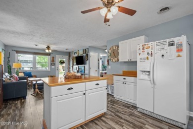 Welcome to 132 NE 3rd St, Oak Island, where laid-back beach on Founders Club At St. James Plantation in North Carolina - for sale on GolfHomes.com, golf home, golf lot