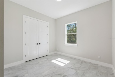 Where Luxury Meets Comfort -- Your Dream Home Awaits on a Full on Wedgefield Golf Club in Florida - for sale on GolfHomes.com, golf home, golf lot