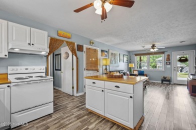 Welcome to 132 NE 3rd St, Oak Island, where laid-back beach on Founders Club At St. James Plantation in North Carolina - for sale on GolfHomes.com, golf home, golf lot
