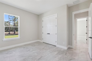 Where Luxury Meets Comfort -- Your Dream Home Awaits on a Full on Wedgefield Golf Club in Florida - for sale on GolfHomes.com, golf home, golf lot