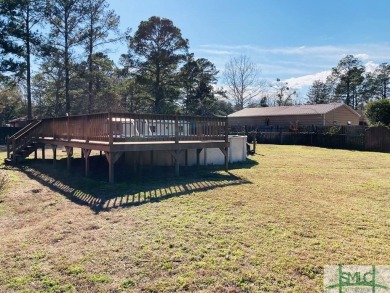 Must see! Gorgeous one story all brick home situated on half an on Cherokee Rose Country Club in Georgia - for sale on GolfHomes.com, golf home, golf lot