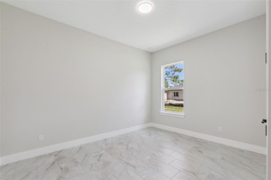 Where Luxury Meets Comfort -- Your Dream Home Awaits on a Full on Wedgefield Golf Club in Florida - for sale on GolfHomes.com, golf home, golf lot