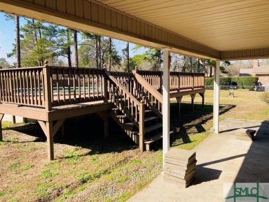 Must see! Gorgeous one story all brick home situated on half an on Cherokee Rose Country Club in Georgia - for sale on GolfHomes.com, golf home, golf lot