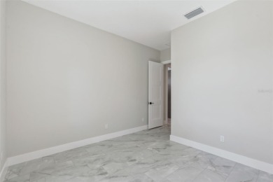 Where Luxury Meets Comfort -- Your Dream Home Awaits on a Full on Wedgefield Golf Club in Florida - for sale on GolfHomes.com, golf home, golf lot