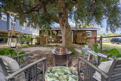 Welcome to 132 NE 3rd St, Oak Island, where laid-back beach on Founders Club At St. James Plantation in North Carolina - for sale on GolfHomes.com, golf home, golf lot