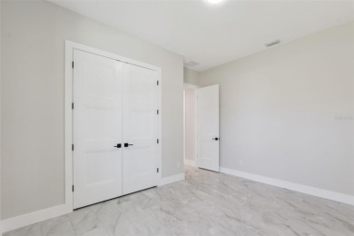 Where Luxury Meets Comfort -- Your Dream Home Awaits on a Full on Wedgefield Golf Club in Florida - for sale on GolfHomes.com, golf home, golf lot