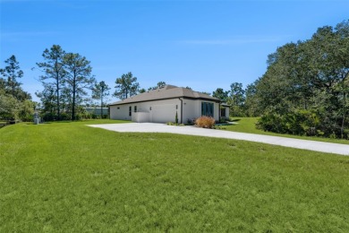 Where Luxury Meets Comfort -- Your Dream Home Awaits on a Full on Wedgefield Golf Club in Florida - for sale on GolfHomes.com, golf home, golf lot